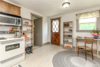 The Laundry Room/Pantry is next to the kitchen