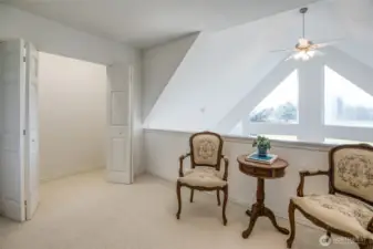 loft sitting area and massive storage closet to the left