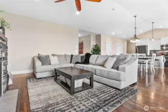 Main living area lends to great room feel w/vaulted ceilings, open & bright!