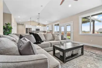 Living room can easily be sectioned off or left open to rest of living area