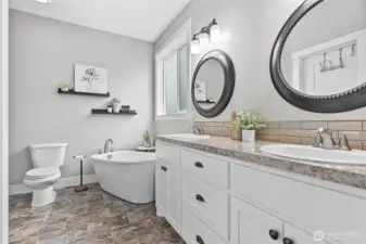 Very spacious ensuite bathroom w/dual vanity, free standing tub, fully tiled walk-in shower & walk-in closet