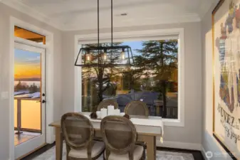 The dining room has easy patio access for grilling or simply stepping outside to unwind with your coffee or wine