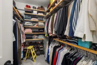 Generous walk-in closet with custom organizers