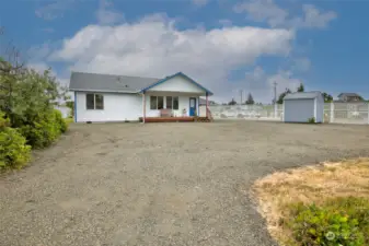 Circular driveway, front of house, shed