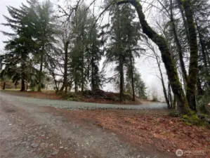 Fresh gravel on the North side of the property. See proximity of the neighbor to the South.