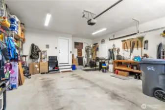 Oversized 2 car garage with generator panel ready.