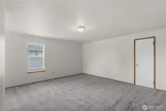 This upper level of Unit A also includes the large bonus room.