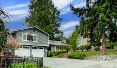 Beautiful park-like lot in sought after Tam O' Shanter Golf and Country Club.  Just painted exterior!