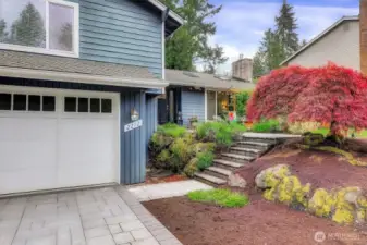 Notice the updated garage doors with windows.