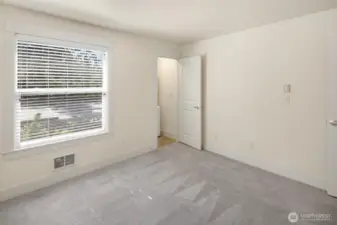 Bedroom with in-unit W/D