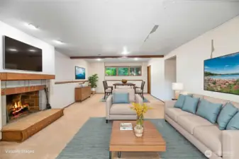 Virtual staged family/Media room downstairs