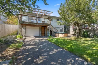 One Car Garage with Paved Driveway.