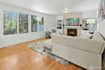 Cozy family room with a brick fireplace.
