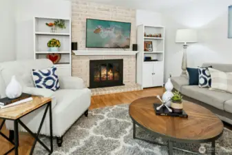 Warm fireplace adds charm and comfort year-round.