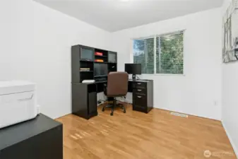 Flexible space ideal for a home office, study, or guest room.