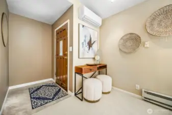 A true entry with space for armoire or other storage options.