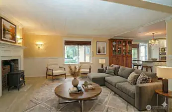 Living room opens gracefully to the kitchen area - Virtually staged to enhance the space.