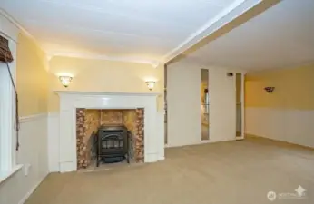 Living area with a pellet stove seamlessly integrated into the fireplace.