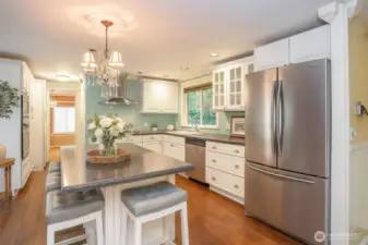 Cook in style! The remodeled kitchen with beautiful cabinets is sure to inspire your inner chef.
