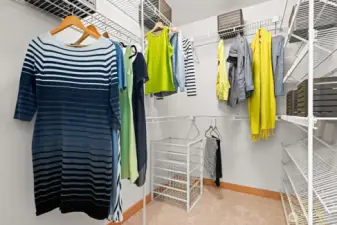 Walk-in closet for the primary bedroom.