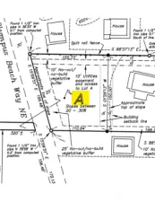 A close up map of Lot A showing a 10' no-build vegetative buffer along the northern boundary and a 10' utility easement from the lot above to Lot A.  (This is the logical area for the water line to gravity feed to this property from the Group B Water System above.)