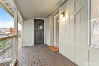 Large covered front porch w/wrap to back porch. Nice attached storage shed through black door