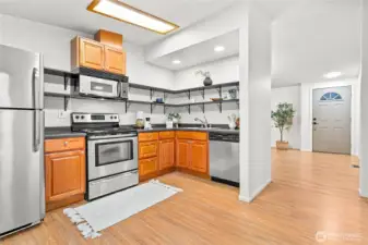 Open kitchen w/stainless steel appliances