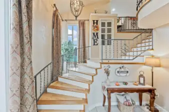 Grand staircase welcomes you as you enter.