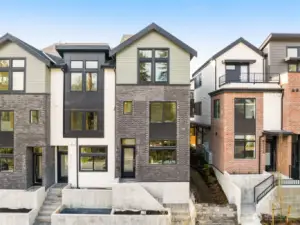 Modern architectural design with sleek lines and large windows, offering incredible curb appeal in a prime location.