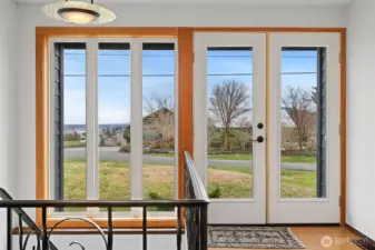 Looking from the front entry to the lights of Fairhaven and Sehome Hill with the bay and boat harbor beyond.