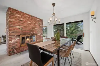 The dining room opens to the very large deck overlooking the spacious rear yard and southerly views and sunsets.