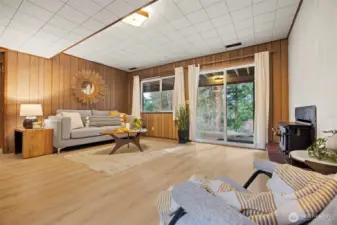 The family room in the lower level opens to a fabulous deck that leads out to the rear yard.