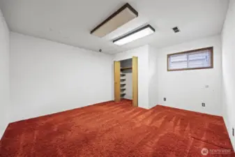 There is a very large 4th bedroom in the lower level adjacent to the bar area.