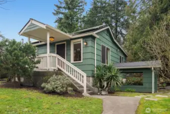 Welcome to this artfully updated farmhouse style home on .4 acre across from a 5 acre park in White Center.