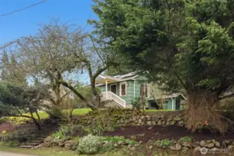 At the end of a dead-end street, there is lots of privacy and you are framed in by mature plantings and stately cedar trees.