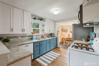 Quartz counters, new cabinet fronts, updated and eco friendly appliances. Gas cooking.