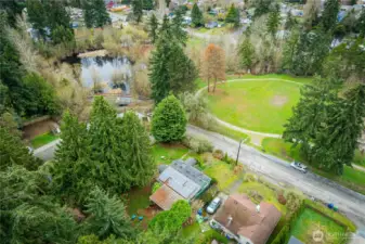 The overhead view of the pond, park and property.