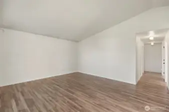 Open living room with vaulted ceiling