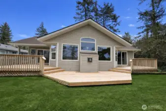 back yard with 3 decks