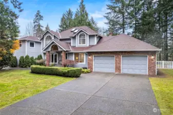 Lovely traditional-style home is nestled on 1.06 acres off of Hunt St. in Gig Harbor, WA, and includes an incredible detached shop/bonus room and plenty of parking for toys, trailers, etc.