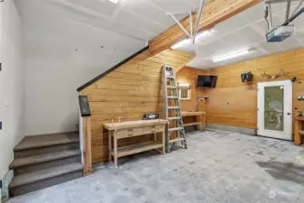 This is the staircase leading up to the expansive 1006 sq. ft. bonus room above this coveted shop.