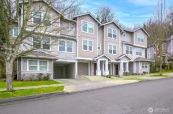 A fresh angle on this corner unit shows its private, light-filled position at the end of the row.