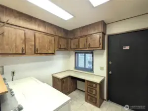 Laundry room with cabinets