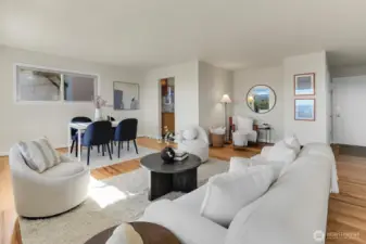 So many ways to set up your living space. The nook with the round mirror is another option for your dining area. Some units have opened up the wall into the kitchen here...