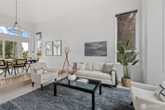 The formal Living Room is filled with natural light.