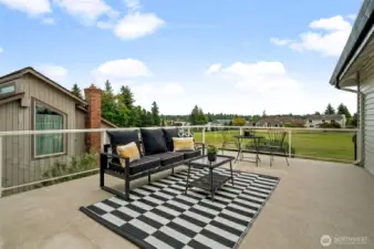 This large private patio is through the Primary Bedroom slider...with beautiful lake and mountain views.