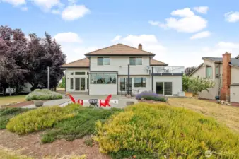 Back view of the house with large patio area.