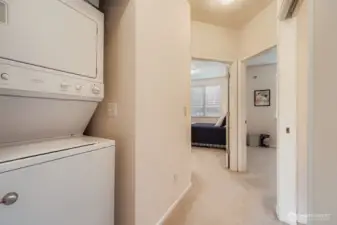 Stack washer and dryer with new ventilation fan.