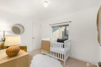 The second bedroom upstairs is an adorable nursery or also can accommodate a larger bed.