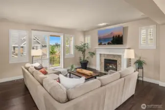 Feat. elevated window covers throughout w/ plantation shutters